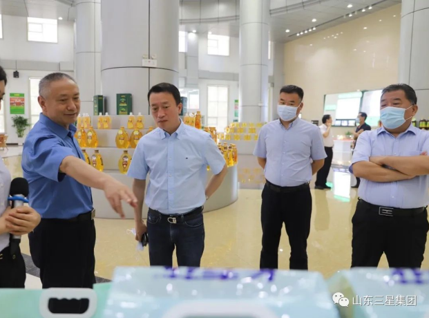 黑龙江省齐齐哈尔市粮食局党组书记、局长周建宇来山东s36沙龙会集团参观调研